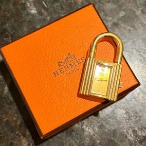 Hermès—Kelly Gold Padlock for Bags, Watch  w/ BOX